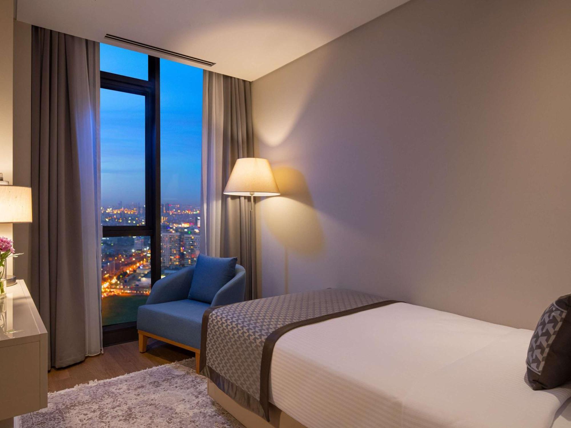 Movenpick Living Istanbul West Hotel Exterior photo A bedroom at the hotel